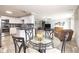 Open dining area adjacent to the kitchen and living room at 2338 Malibu Ct, Anderson, IN 46012