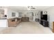 Open-concept living room featuring a sectional couch, and great natural light at 2338 Malibu Ct, Anderson, IN 46012