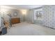 Bright living room with hardwood floors, neutral walls, and large windows at 2338 Malibu Ct, Anderson, IN 46012