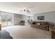 Inviting living room with a sliding glass door offering backyard views at 2338 Malibu Ct, Anderson, IN 46012