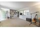 Spacious living room featuring built-in shelving and abundant natural light at 2338 Malibu Ct, Anderson, IN 46012
