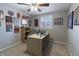 Fully decorated office with a neutral carpet, a large desk and lots of memorable decorations at 2338 Malibu Ct, Anderson, IN 46012