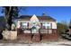 Quaint house with brown deck and purple shutters at 302 E Cowing Dr, Muncie, IN 47303
