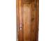 Wood door with ornate detailing and brass knob at 302 E Cowing Dr, Muncie, IN 47303