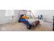 bedroom with a race car bed, playful decor, and carpeted floor at 4416 Voyageur Way, Carmel, IN 46074