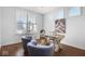 Well-lit home office, featuring a desk and comfortable seating at 4416 Voyageur Way, Carmel, IN 46074