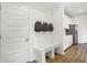 Clean entryway with built-in bench and storage at 5904 Sunstone Rd, Indianapolis, IN 46239