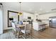 Modern kitchen with white cabinets, stainless steel appliances, and an island at 5904 Sunstone Rd, Indianapolis, IN 46239