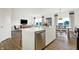 Open kitchen with stainless steel appliances and breakfast bar at 5904 Sunstone Rd, Indianapolis, IN 46239