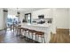 Modern kitchen with white cabinets, quartz countertops, and island at 5904 Sunstone Rd, Indianapolis, IN 46239