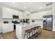 Spacious kitchen with island, stainless steel appliances, and hardwood floors at 5904 Sunstone Rd, Indianapolis, IN 46239