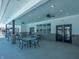 Outdoor seating area with ceiling fans and lounge chairs near the community pool at 6013 Granby Dr, Whitestown, IN 46075