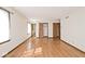 Spacious bedroom with hardwood floors, large windows, and ample closet space at 6826 E 65Th St, Indianapolis, IN 46220