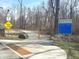 Walking and bike path into the woods for walking, biking and communing with nature at 6826 E 65Th St, Indianapolis, IN 46220