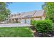 Spacious three car garage with an extra long driveway and manicured landscaping at 7837 Dean Rd, Indianapolis, IN 46240