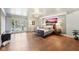 Airy main bedroom with hardwood floors, ample natural light, and elegant decor at 7837 Dean Rd, Indianapolis, IN 46240