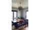 Dining room with wooden table and chairs, and a chandelier at 917 E 34Th St, Indianapolis, IN 46205