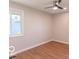 Spacious bedroom with hardwood floors and ceiling fan at 10138 Catalina Dr, Indianapolis, IN 46235