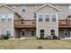 Townhome backyard with wooden deck and ample green space at 11436 Mossy Ct # 102, Fishers, IN 46037