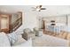 Modern kitchen with gray cabinets, island, and stainless steel appliances at 11436 Mossy Ct # 102, Fishers, IN 46037