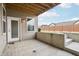 Spacious ground-level patio, boasting a white door, concrete steps, and yard views at 11436 Mossy Ct # 102, Fishers, IN 46037