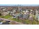 Aerial view of neighborhood with a charming two-story home with a welcoming front porch at 1224 Keystone Ave, Indianapolis, IN 46201