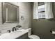 Stylish bathroom with a vessel sink, shiplap walls, and modern fixtures and natural light at 1224 Keystone Ave, Indianapolis, IN 46201
