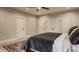 Spacious bedroom with neutral walls, light wood floors and three closets at 1224 Keystone Ave, Indianapolis, IN 46201