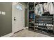 Mud room by door provides organization with shelving and storage for shoes, coats and bags at 1224 Keystone Ave, Indianapolis, IN 46201