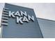 Exterior shot of KAN-KAN, featuring modern architectural design and clear signage at 1224 Keystone Ave, Indianapolis, IN 46201