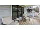 Inviting covered front porch with comfortable seating, offering a cozy space to relax and enjoy the neighborhood at 1224 Keystone Ave, Indianapolis, IN 46201