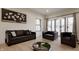 Living room offering modern furniture, hardwood floors, and decor for a welcoming atmosphere at 1224 Keystone Ave, Indianapolis, IN 46201