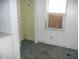 Bedroom with closet, window, and dirty carpet at 1300 W 13Th St, Muncie, IN 47302