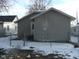 Rear view of house with chain link fence at 1300 W 13Th St, Muncie, IN 47302