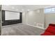 Finished basement with movie screen and modern design at 233 W Westfield Blvd, Indianapolis, IN 46208