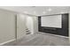 Finished basement with movie screen and stairs at 233 W Westfield Blvd, Indianapolis, IN 46208