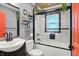 Stylish bathroom with modern fixtures and unique window at 233 W Westfield Blvd, Indianapolis, IN 46208