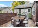 Outdoor dining table for eight on a wood deck provides a beautiful space to entertain at 233 W Westfield Blvd, Indianapolis, IN 46208