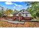 A well-maintained single Gathering home with inviting front yard and mature trees at 233 W Westfield Blvd, Indianapolis, IN 46208