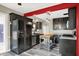 Well-equipped kitchen featuring sleek black cabinets and stainless steel appliances for the modern chef at 233 W Westfield Blvd, Indianapolis, IN 46208
