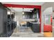 Charming kitchen with black cabinetry and a butcher block island, great for cooking and casual dining at 233 W Westfield Blvd, Indianapolis, IN 46208