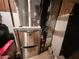 Unfinished basement with HVAC unit and water heater at 3163 S 25 E, Shelbyville, IN 46176