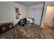 Bright bedroom with double closet and wall-mounted shelving at 3163 S 25 E, Shelbyville, IN 46176