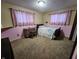 Charming bedroom with pink walls and whimsical decor at 3163 S 25 E, Shelbyville, IN 46176