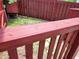 Close up on the elevated backyard deck with red painted fence at 3163 S 25 E, Shelbyville, IN 46176