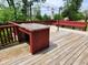 Spacious wooden deck with bar, gazebo, and bench seating at 3163 S 25 E, Shelbyville, IN 46176