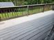 View of the home's elevated wooden deck with railing at 3163 S 25 E, Shelbyville, IN 46176