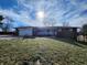 Brick ranch house with attached garage, covered porch, and landscaped yard at 3163 S 25 E, Shelbyville, IN 46176