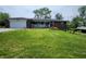Charming single-story brick home with attached garage and landscaped front yard at 3163 S 25 E, Shelbyville, IN 46176
