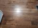 Dark brown hardwood floors throughout the main living areas at 3163 S 25 E, Shelbyville, IN 46176